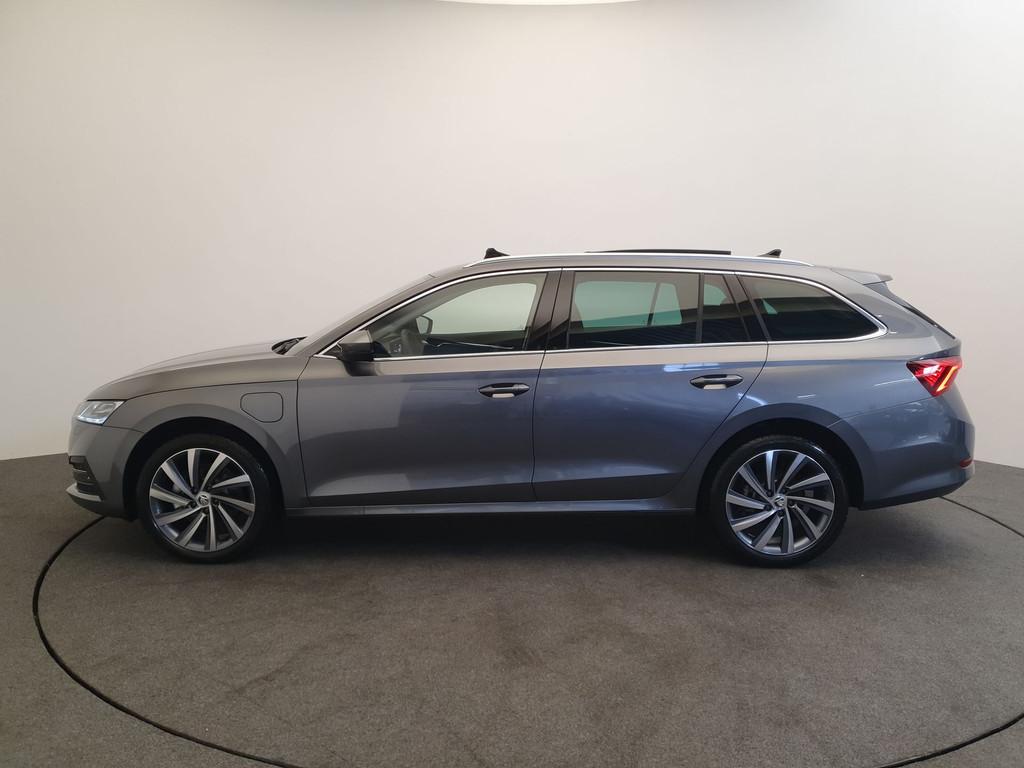 Skoda Octavia Combi 1.4 TSI 204pk DSG/AUT iV PHEV Style Busi, 12 maanden, Stof, Gebruikt, Zwart