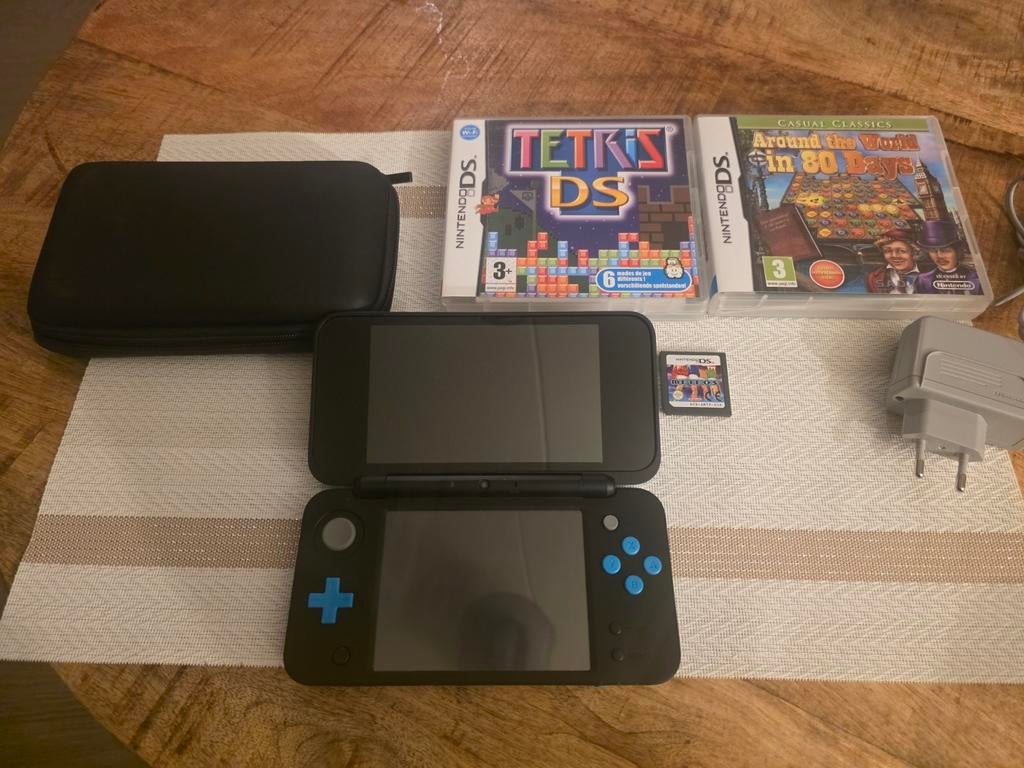 New Nintendo 2DS XL met games en hoesje, Ophalen of Verzenden, Zo goed als nieuw, Met beschermhoes of tas, Zwart