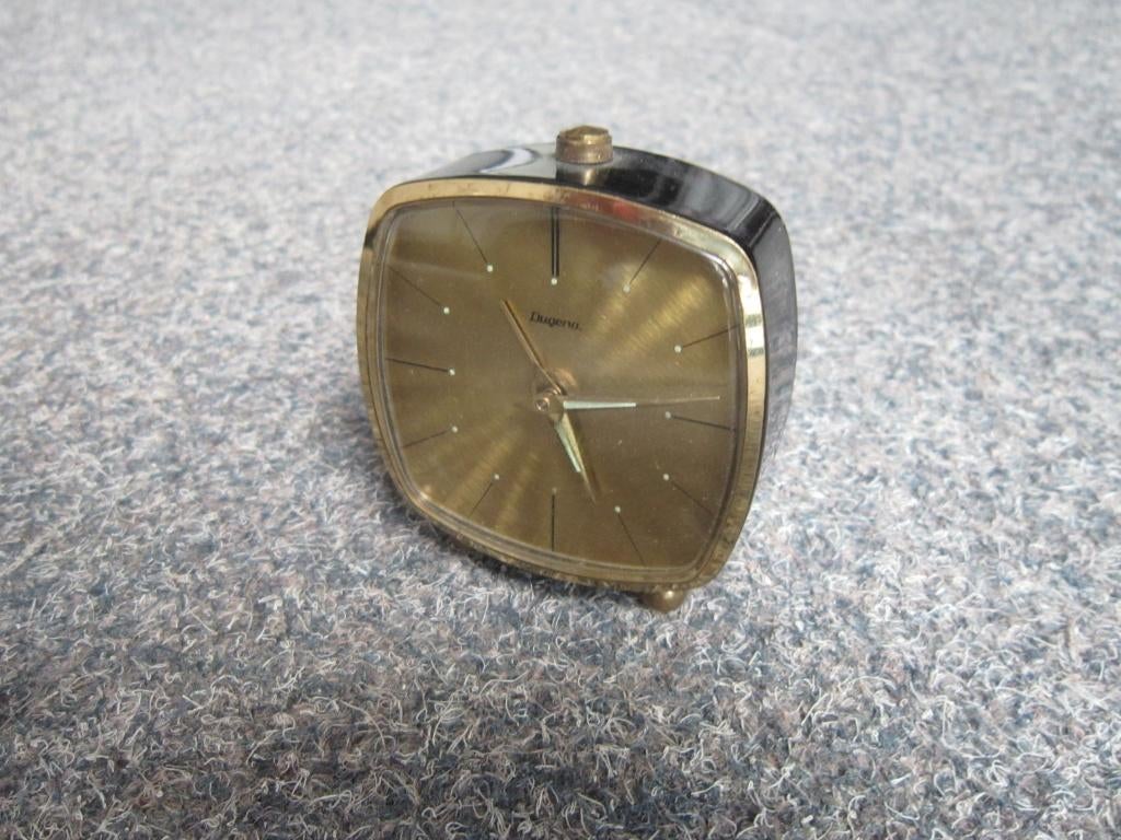 DUGENA REISWEKKER TAFELKLOK, Ophalen