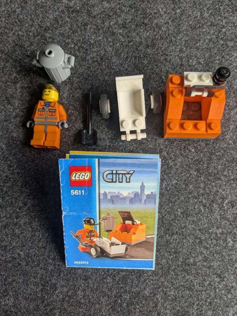 Lego City 5611 Vuilnisman met vuilnisbak en kruiwagen, Compleet, Lego, Ophalen of Verzenden, Complete set
