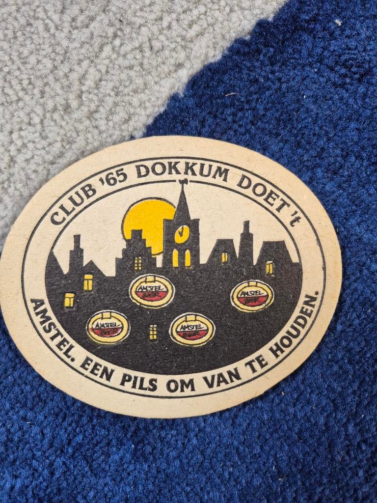Amstel bierviltje - Club '65 Dokkum Doet 't, Verzamelen, Biermerken, Ophalen of Verzenden, Gebruikt, Viltje(s), Amstel