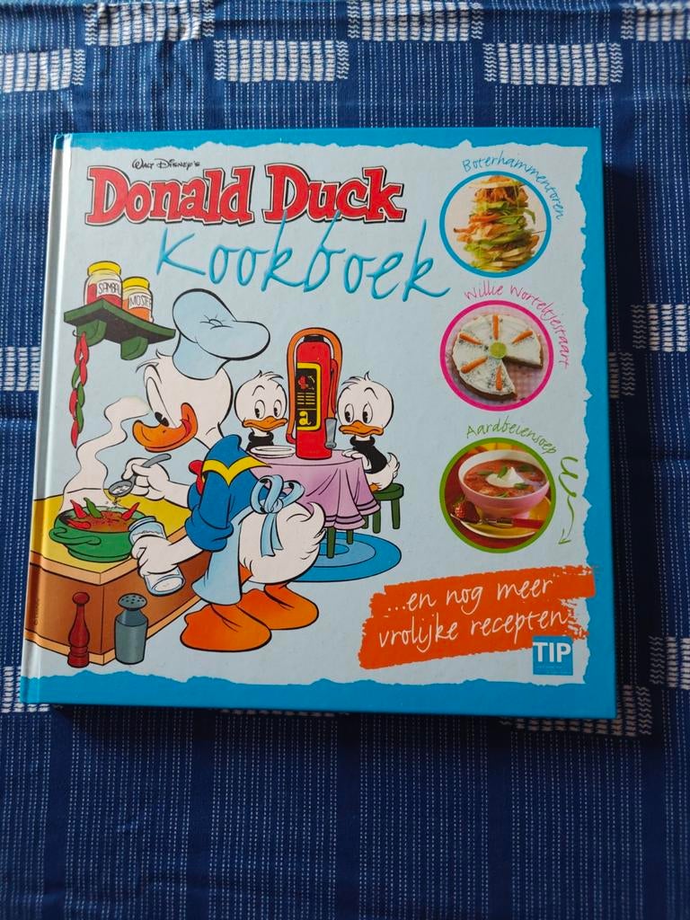 Donald Duck Kookboek - Nieuwstaat - Vrolijke recepten, Boeken, Ophalen of Verzenden