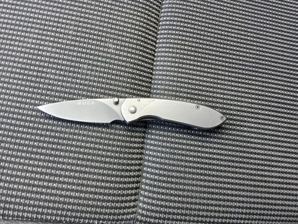 Titanium Buck mes, Ophalen, Zo goed als nieuw