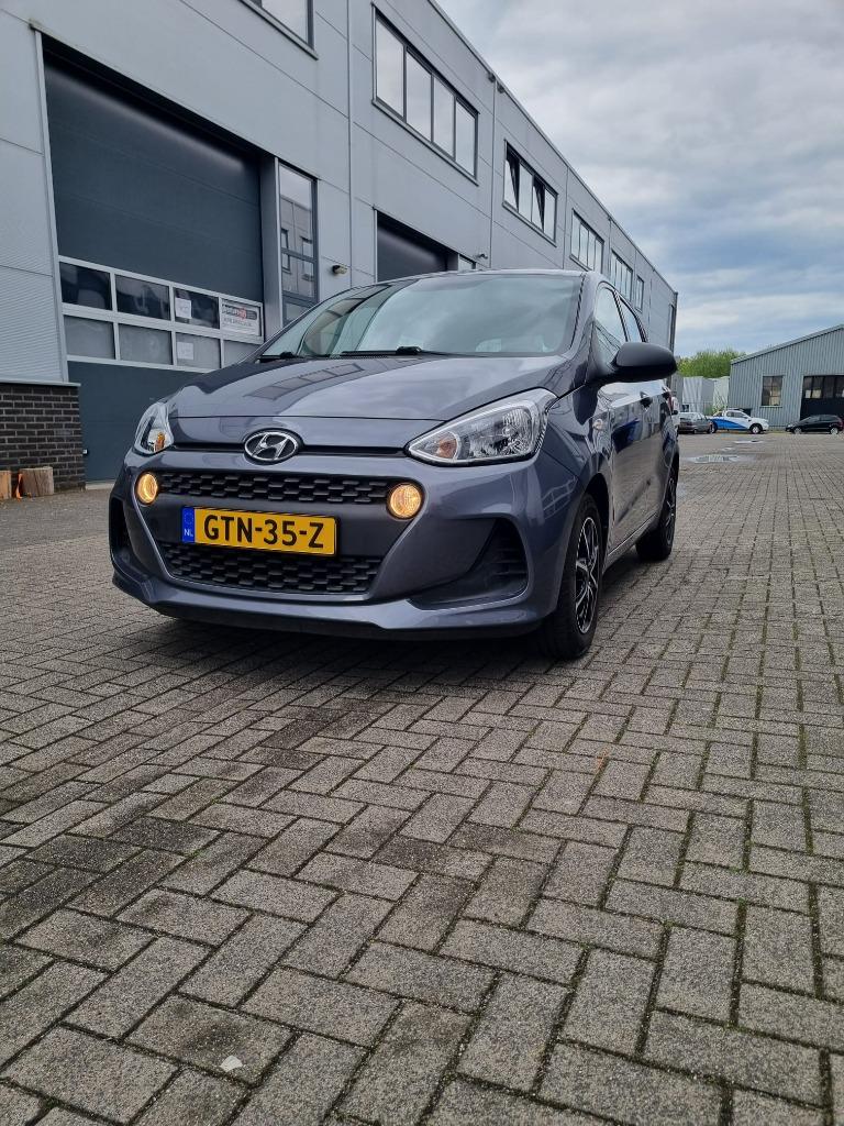 Hyundai i10 1.0i 66pk 5pl. Aut 2019 Grijs, Auto's, Bedrijf, 927 kg, 998 cc, 66 pk