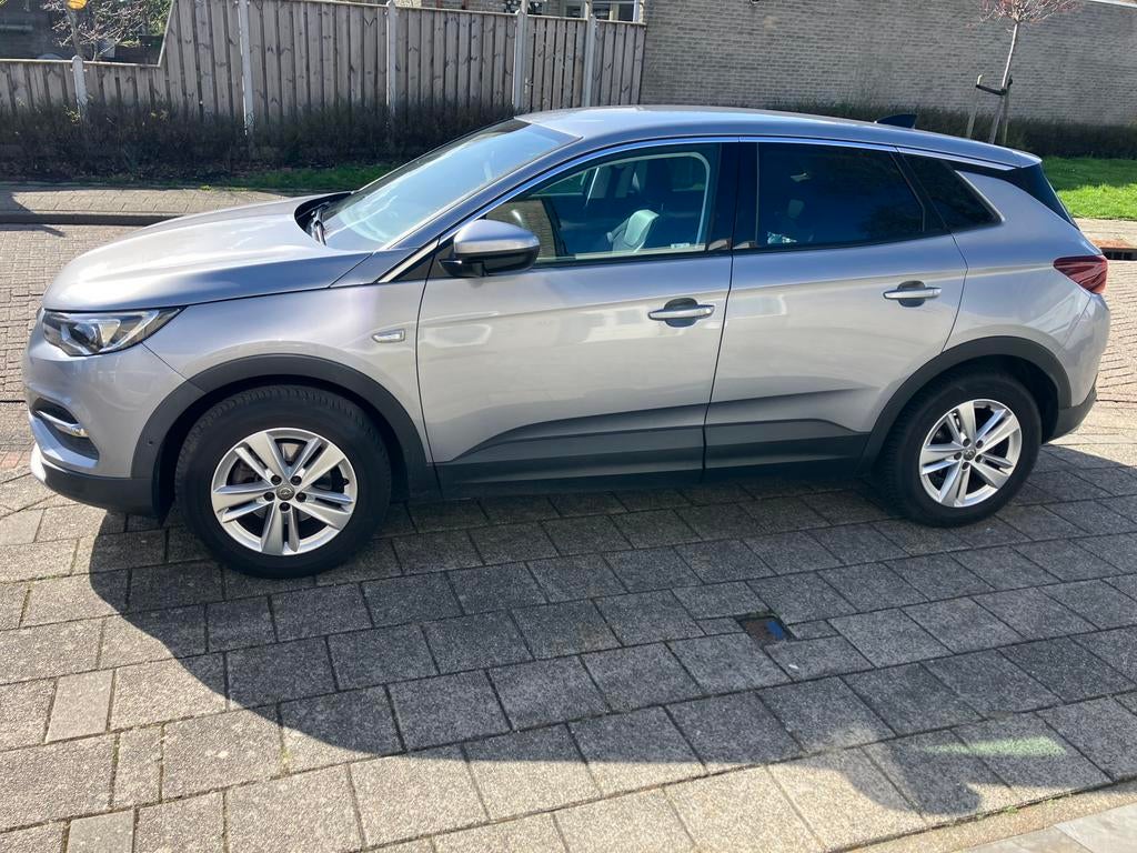 Opel Grandland X 1.2 Turbo 130pk S&S 2018 Grijs, Auto's, Voorwielaandrijving, 1199 cc, Handgeschakeld, 3 cilinders
