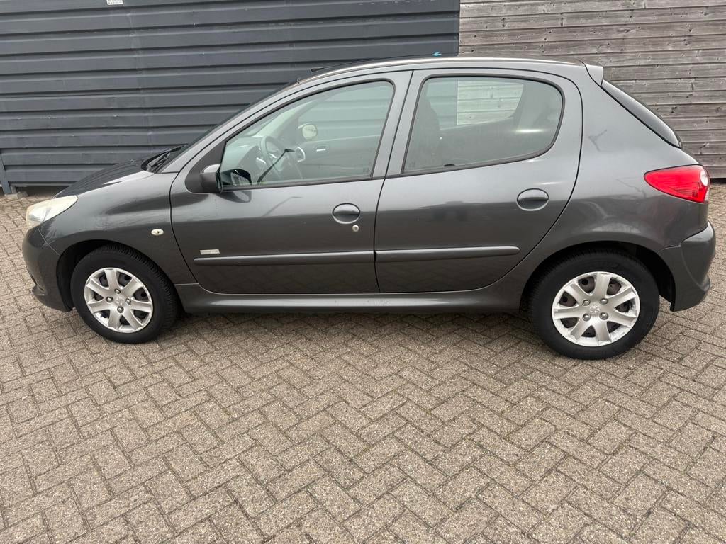 Peugeot 206+ 1.4 5D 2011 grijs, Auto's, Peugeot, 206+, Stof, 1360 cc, 31 €/maand