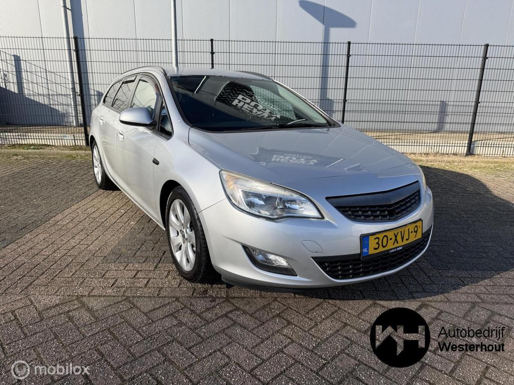 Opel Astra Sports Tourer 1.4 Cosmo Airco Navi Parkeersensore, Auto's, Voorwielaandrijving, Euro 5, 101 pk, Gebruikt