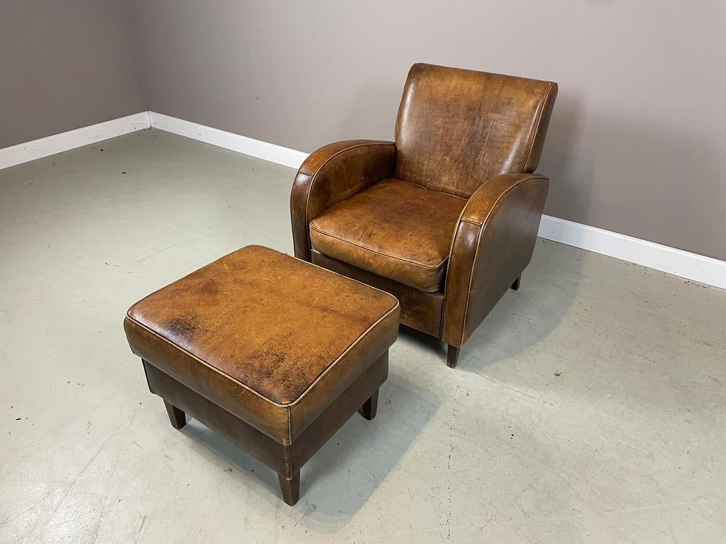 Schapenleren “Wagenwiel” fauteuil van King’s Design I.Z.G.S., Ophalen, Gebruikt, Leer