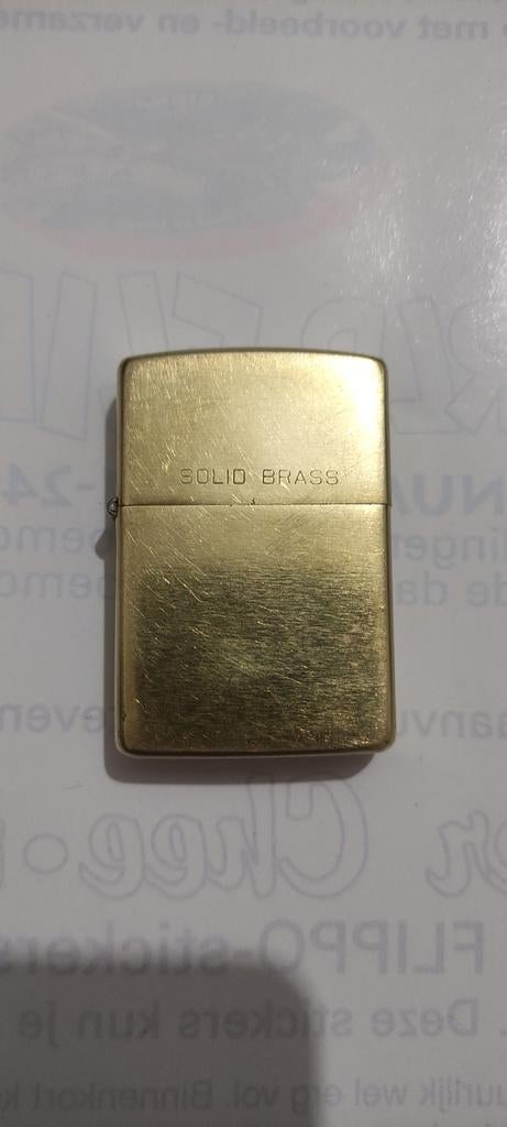 Zippo aansteker Solid Brass 1991, Verzamelen, Rookartikelen, Aanstekers en Luciferdoosjes, Ophalen of Verzenden, Gebruikt, Aansteker