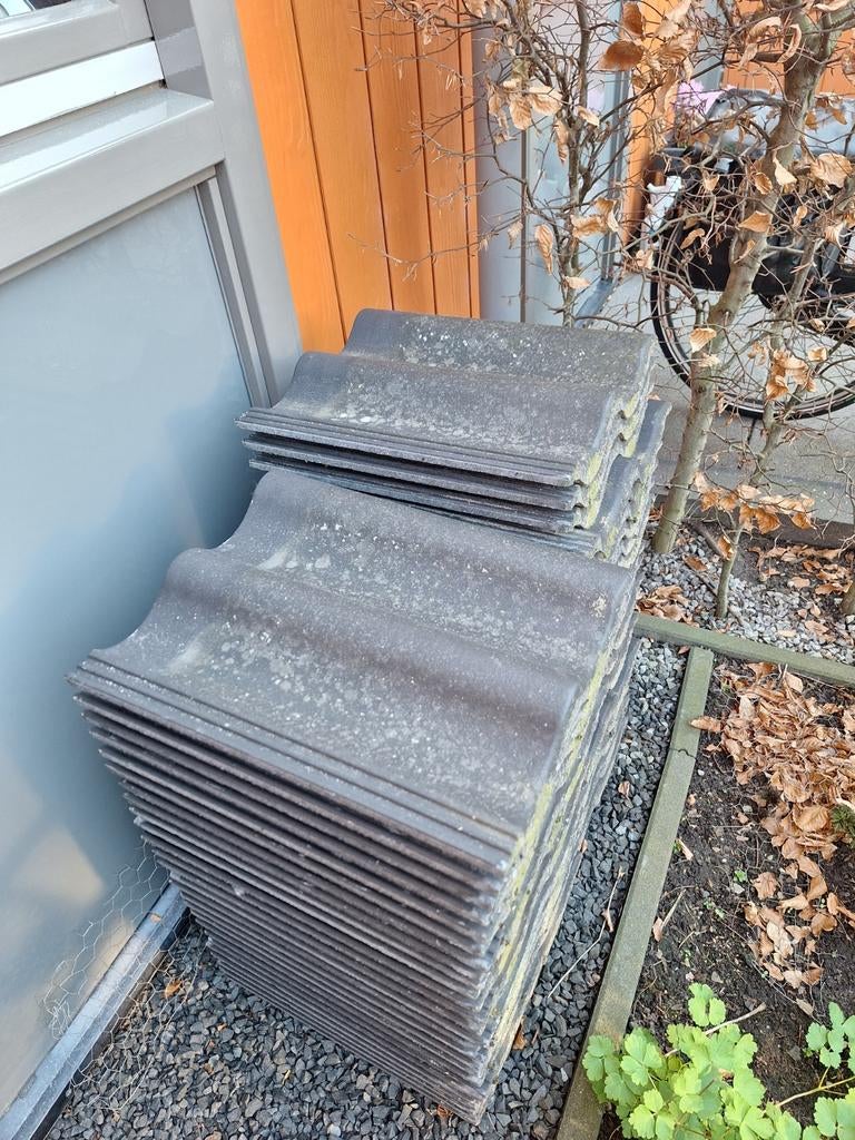 54 antracietgrijze dakpannen, Ophalen