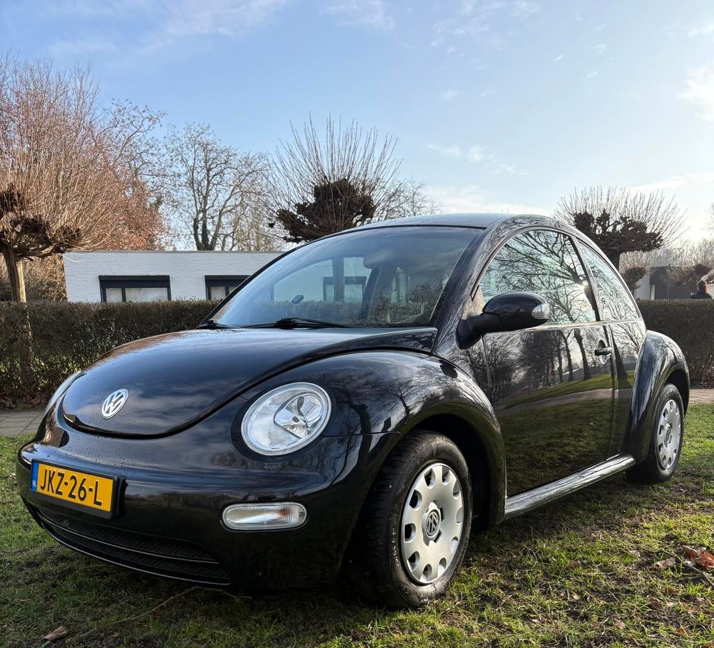 Volkswagen New Beetle, 116000km, Leer, airco, 1600 cc, Zwart, Leder, Handgeschakeld
