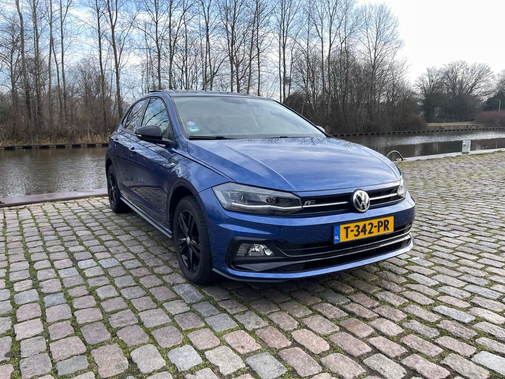 Volkswagen Polo 1.0 TSI DSG “R-Line” | Reef Blue Metallic, Stof, 95 pk, Blauw, 49 €/maand