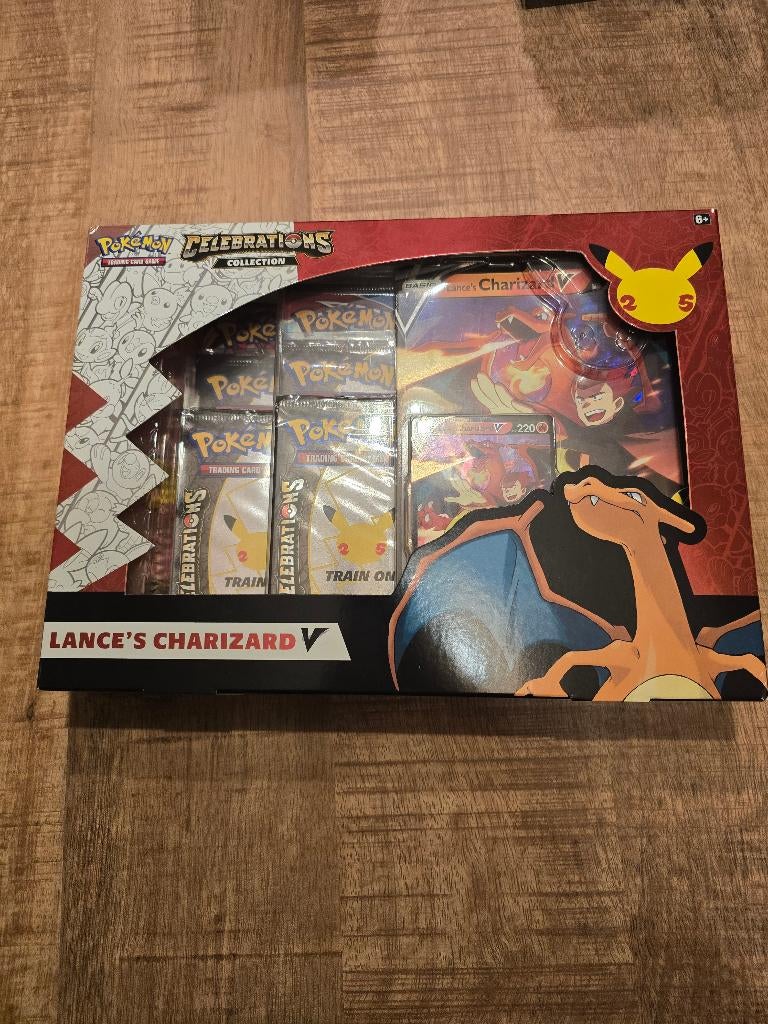 Celebrations Collection: Lance’s Charizard, Hobby en Vrije tijd, Verzamelkaartspellen | Pokémon, Ophalen of Verzenden, Zo goed als nieuw