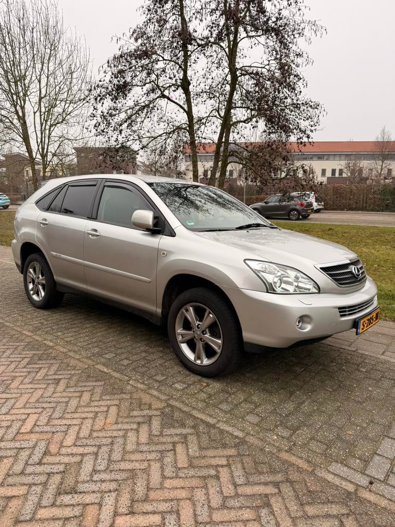 Lexus RX 400h Youngtimer|Mark Levinson|Leder |Dealerhistorie, Auto's, Lexus, Automaat, 3311 cc, Zwart, Leder