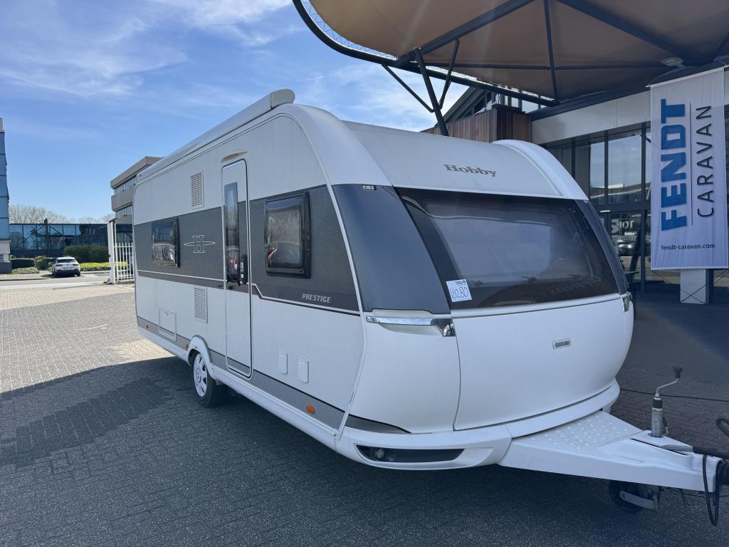 Hobby Prestige 560 WFU 2018 Mover,Airco,Luifel!!, Caravans en Kamperen, Caravans, Standaardzit, Bedrijf, 5 tot 6 meter, Schokbreker