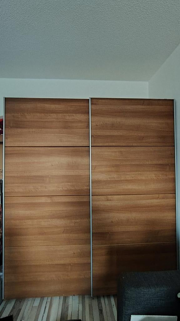 Kledingkast met schuifdeuren, Ophalen