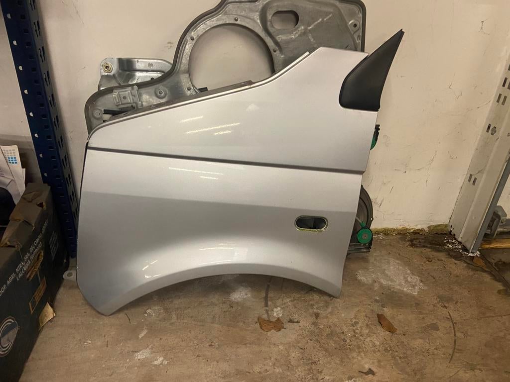 Volkswagen Transporter T5 spatbord LV LA7W, Ophalen, Links, Volkswagen, Spatbord