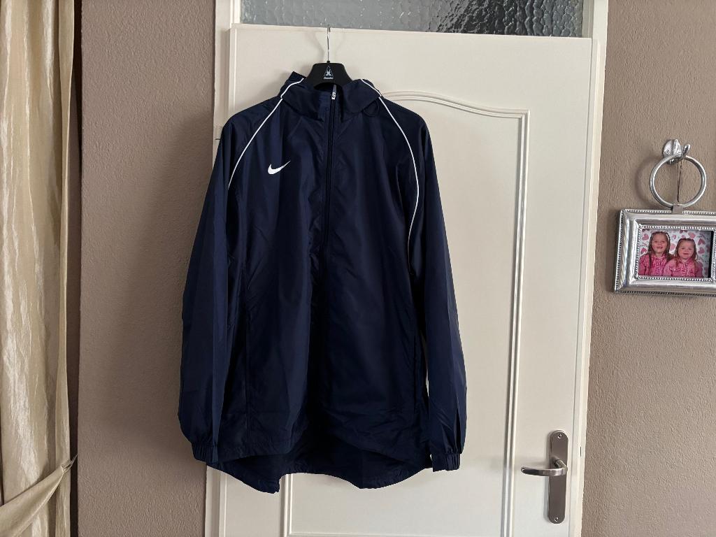 Te koop een originelen sportjas regenjas xl van Nike, Ophalen of Verzenden, Nieuw, Maat 56/58 (XL)