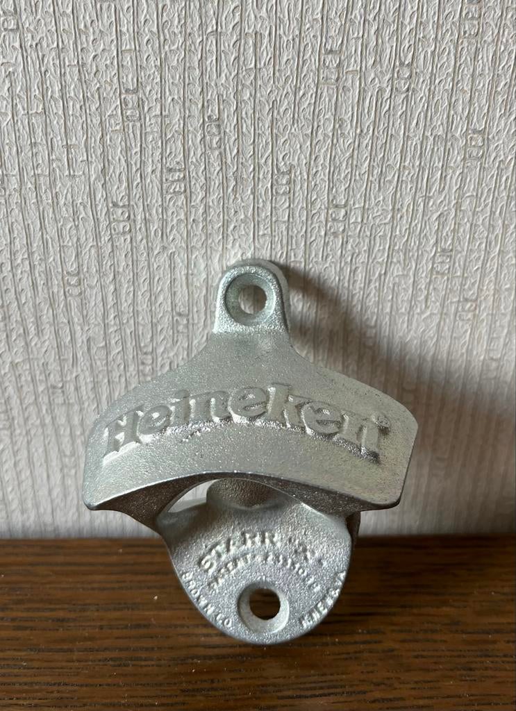 Nieuwe metalen Heineken wand flesopener jaren 80, Verzamelen, Biermerken, Ophalen of Verzenden, Nieuw, Flesopener, Heineken