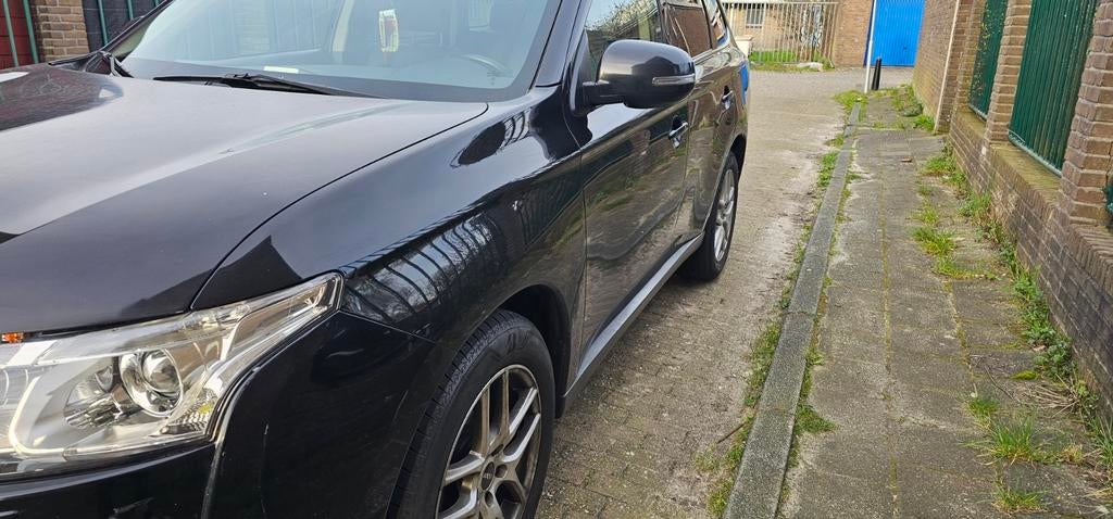 Mitsubishi Outlander 2.0 MPI 2WD CVT 2012 Zwart, Automaat, Outlander, Zwart, 7 stoelen