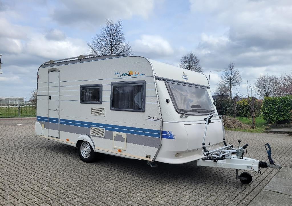 zeer nette Hobby De Luxe Easy 440 te koop, Caravans en Kamperen, Schokbreker, Hobby, Bedrijf, Treinzit
