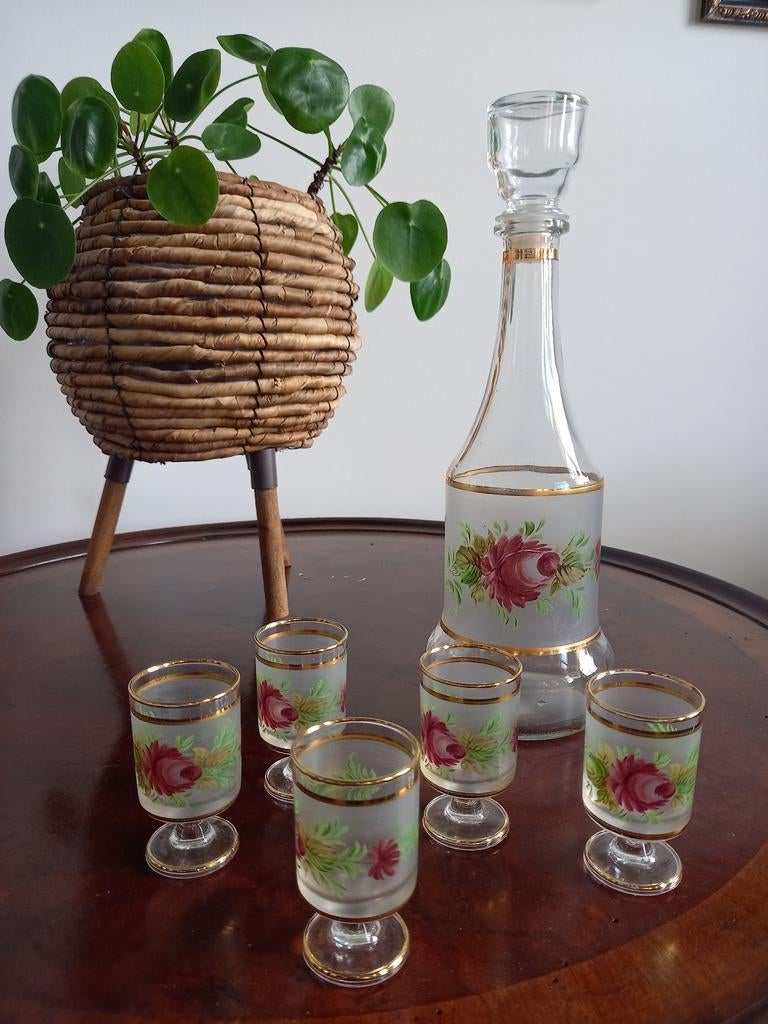 Karaf met 5 borrelglaasjes, Ophalen