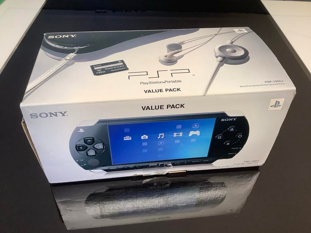 Sony PSP-1004k Value Pack met 7 spellen. Compleet met doos., Met games, Zwart, Ophalen of Verzenden, Zo goed als nieuw
