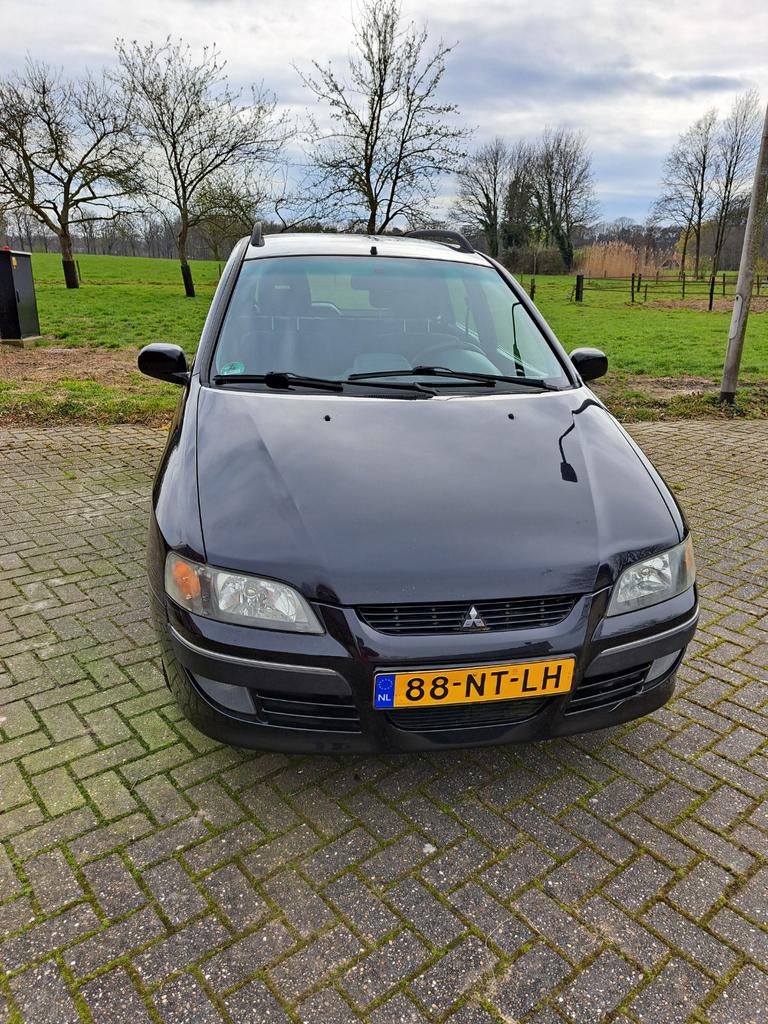 Mitsubishi Space Star 1.6 Comfort AUT 2004 Zwart, Auto's, 4 cilinders, Zwart, 1200 kg, Particulier