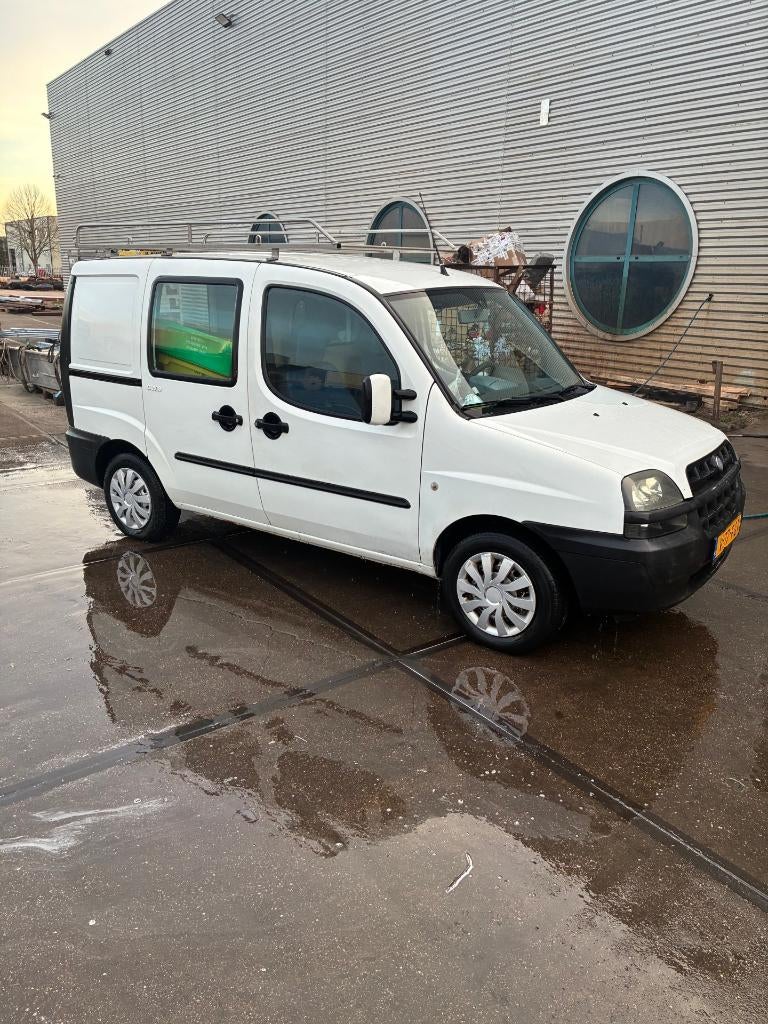 Fiat Doblo 2005 Benzine Airco, Auto's, Bestelauto's, 1596 cc, 1283 kg, Wit, 103 pk
