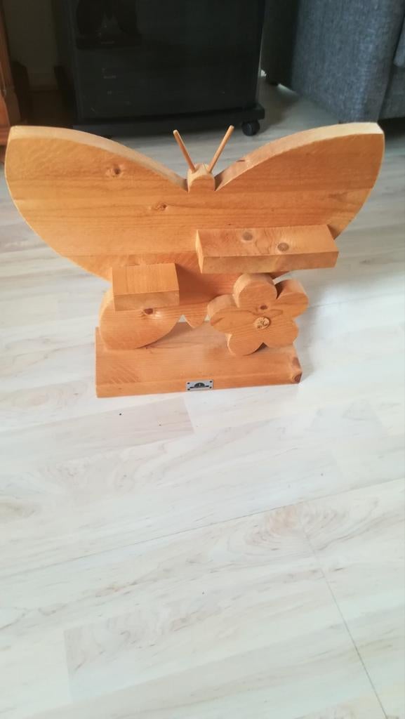 Houten vlinder, Ophalen, Zo goed als nieuw