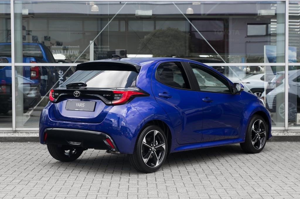 Toyota Yaris Hybrid 130 130pk CVT Executive, Stof, Gebruikt, Zwart, Blauw