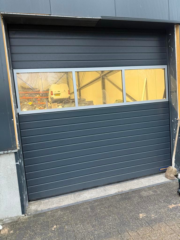Horman industriedeur 3x3 meter met rails antricietgrijs, Doe-het-zelf en Verbouw, Deuren en Horren, Ophalen, Gebruikt, Garagedeur
