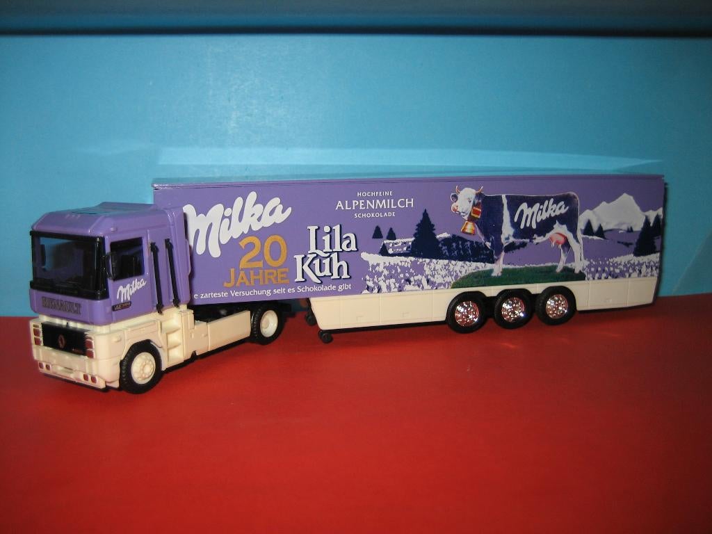 Milka  20jr.  Lila-Kuh  RENAULT met oplegger  Herpa/Albedo, Ophalen of Verzenden, Zo goed als nieuw, Bus of Vrachtwagen, Herpa