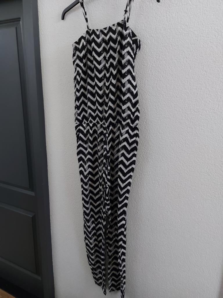 Zwart-witte jumpsuit maat L, Ophalen of Verzenden