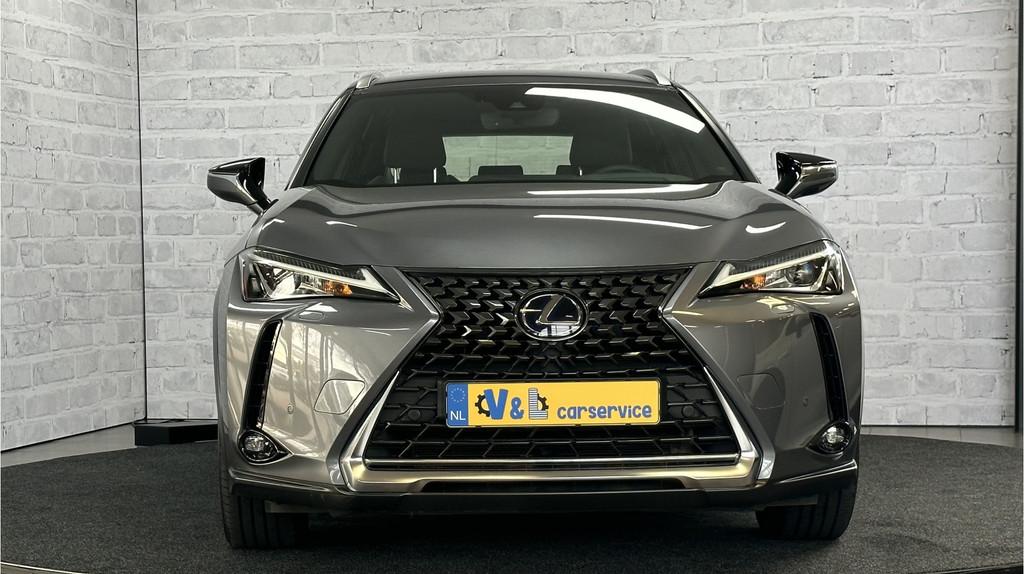Lexus UX 250h First Edition / Stoel/stuurverwr / Carplay / A, Auto's, Lexus, Stof, Gebruikt, 4 cilinders, Grijs