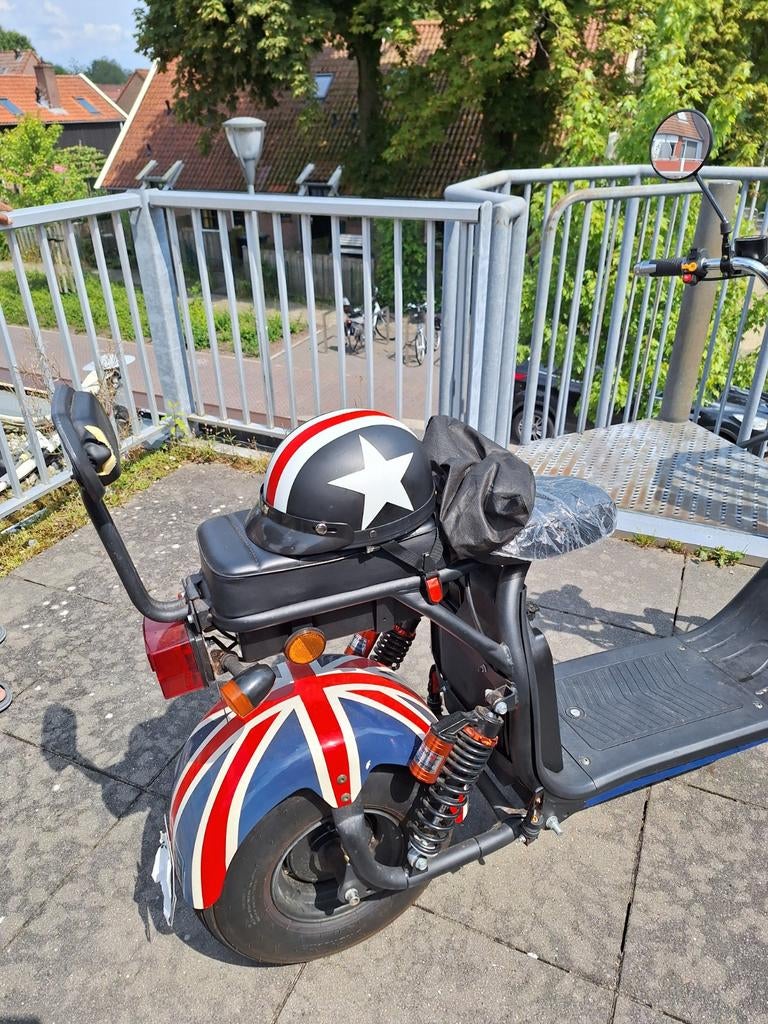 E chopper met Union Jack design, Ophalen