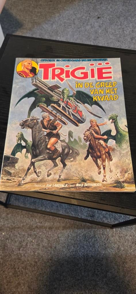 Trigië: In de Greep van het Kwaad, Eén stripboek, Ophalen of Verzenden, Gelezen