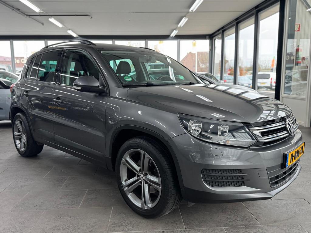 Volkswagen Tiguan 1.4 TSI Sport&Style navi clima cruise cont, Auto's, Voorwielaandrijving, Stof, 4 cilinders, 150 pk