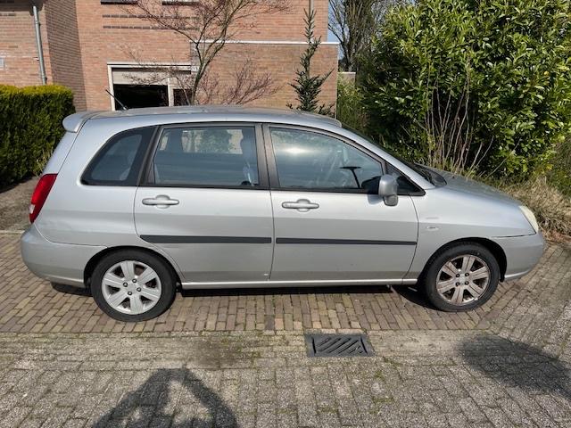 Suzuki Liana 1.6 AUT 2003 Grijs, Auto's, Suzuki, Stof, 4 cilinders, 400 kg, 49 €/maand
