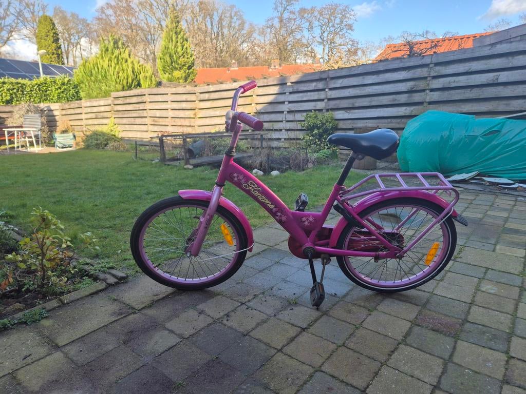 Roze kinderfiets, Ophalen