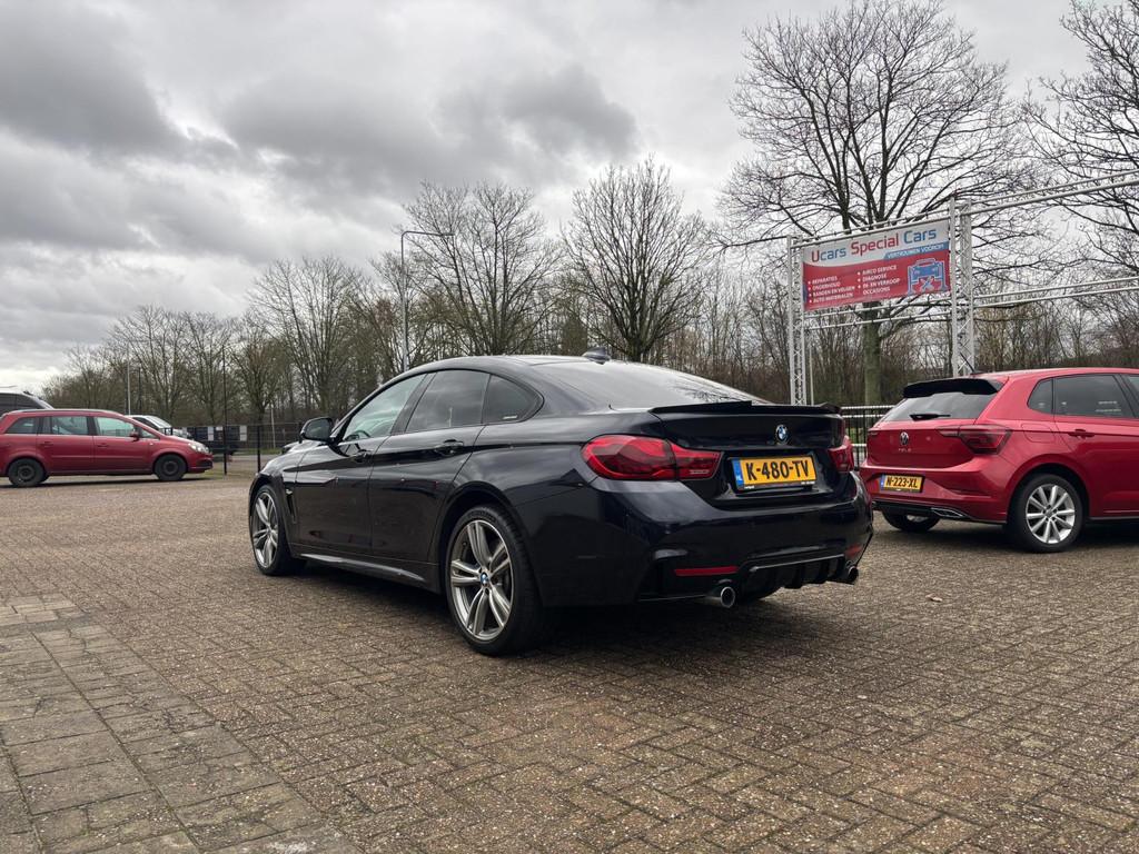 BMW 4-serie Gran Coupé 440i xDrive Centennial High Executiv, Auto's, 327 pk, Alcantara, Zwart, 14 km/l