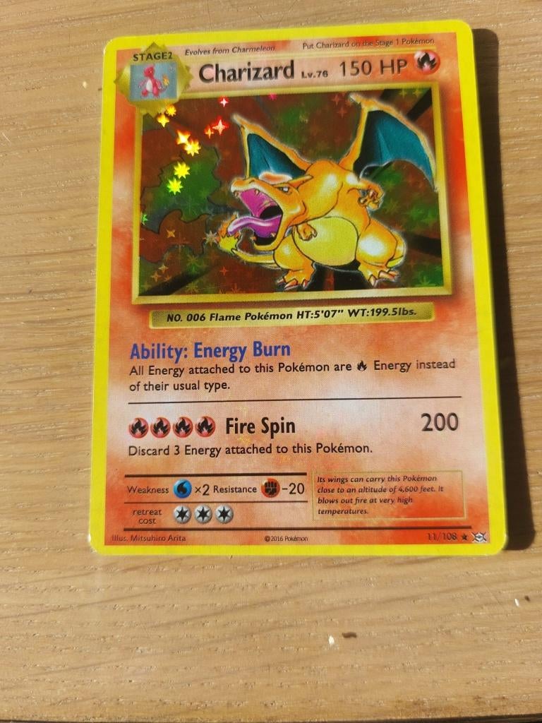 Charizard Evolutions Revese Holo Rare Pokémon 11/108, Ophalen of Verzenden, Zo goed als nieuw, Losse kaart