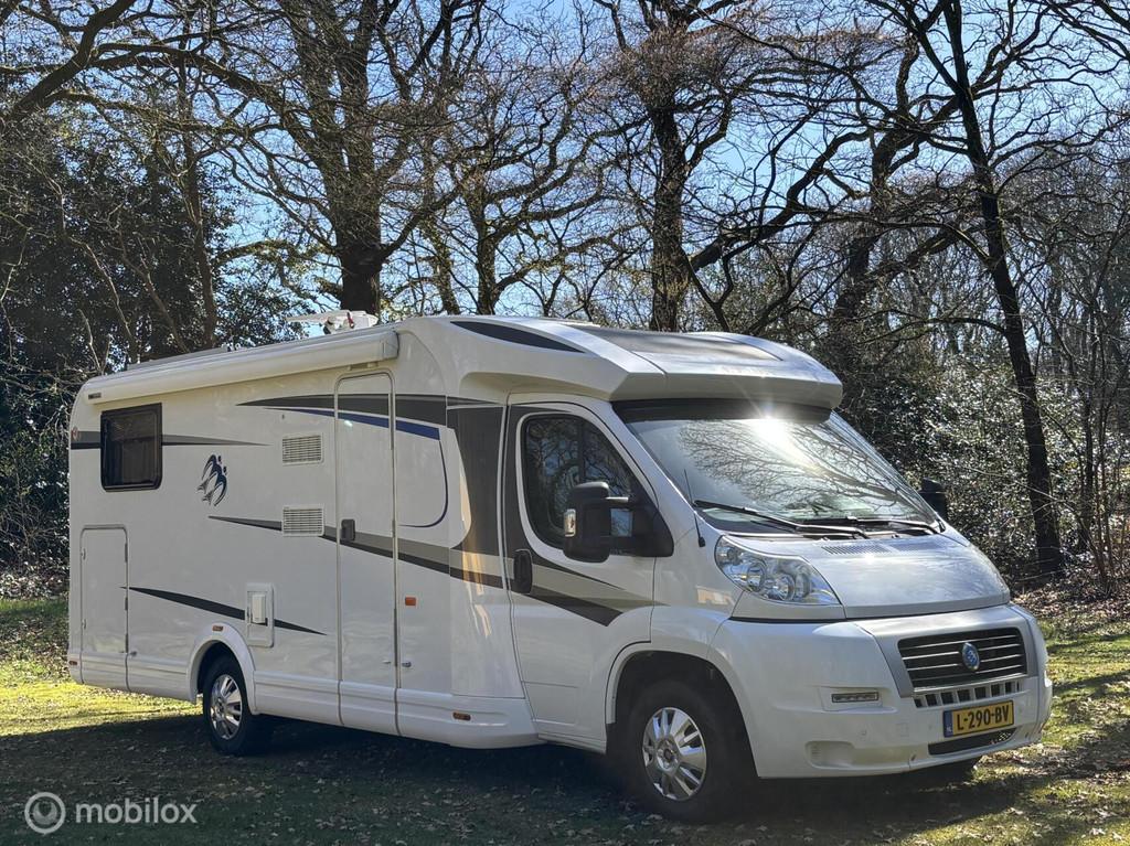 Knaus Sky Ti 700 MEG Fiat 2.3 130pk Euro 5 | Enkele-bedden |, Caravans en Kamperen, Campers, Airbags, Tot en met 2, 7 tot 8 meter
