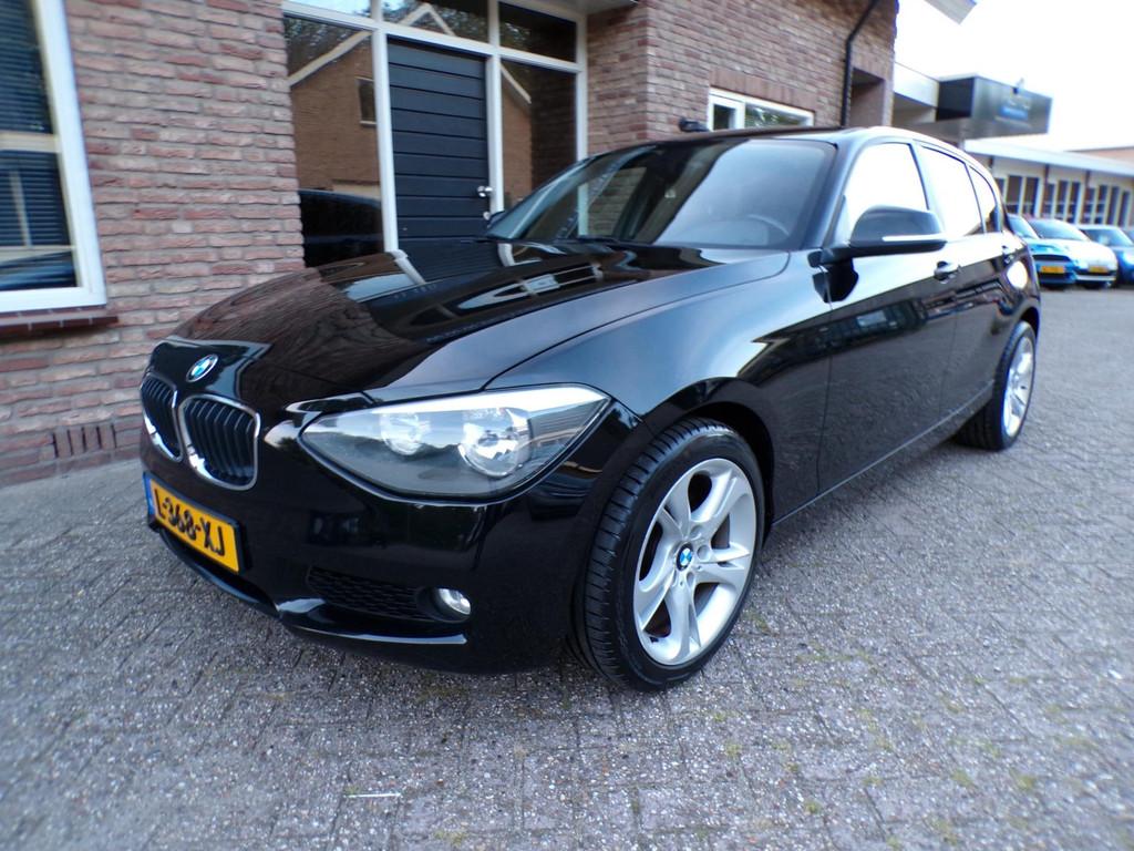 BMW 1-serie 114i EDE Business, Auto's, 1-Serie, Euro 5, Gebruikt, Zwart