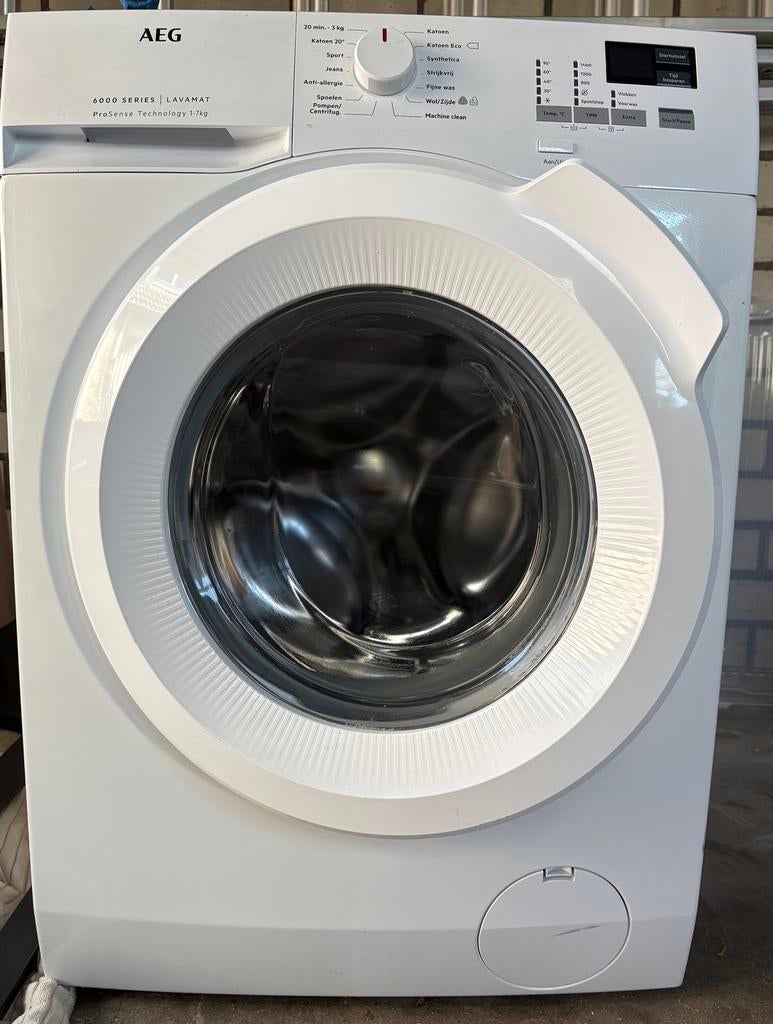 AEG wasmachine model L6FB74KT, Ophalen, Zo goed als nieuw, 1200 tot 1600 toeren, 85 tot 90 cm