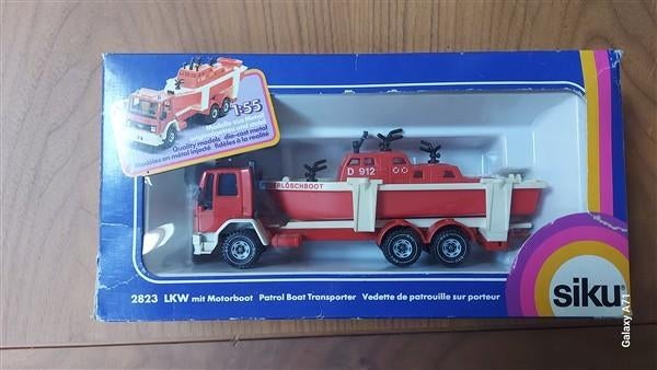 Siku 2823 Ford met motorboot, Hobby en Vrije tijd, Modelauto's | 1:50, Ophalen of Verzenden, Gebruikt, Bus of Vrachtwagen, SIKU