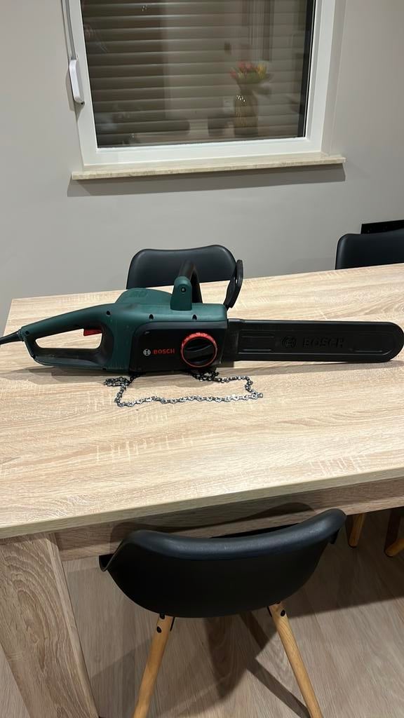 1x gebruikt Bosch universal Chain 35 Kettingzaag, Ophalen of Verzenden, Zo goed als nieuw, Elektrisch