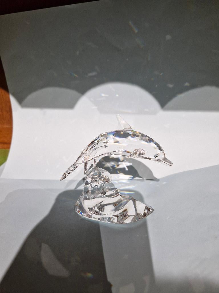 Swarovski dolfijn op golf, Verzamelen, Swarovski, Ophalen of Verzenden, Zo goed als nieuw, Figuurtje