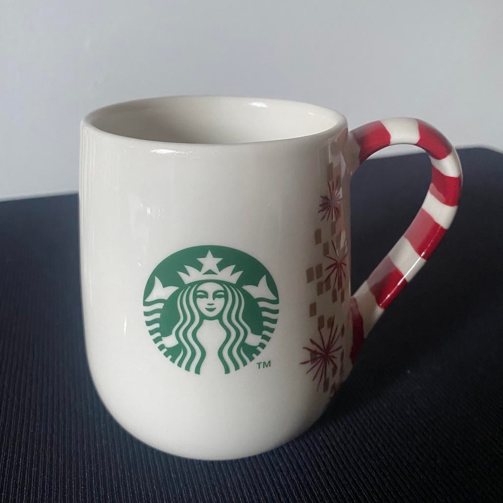 Mok van Starbucks (kersteditie uit 2014)., Ophalen of Verzenden, Zo goed als nieuw, Overige stijlen, Kop(pen) en/of Schotel(s)