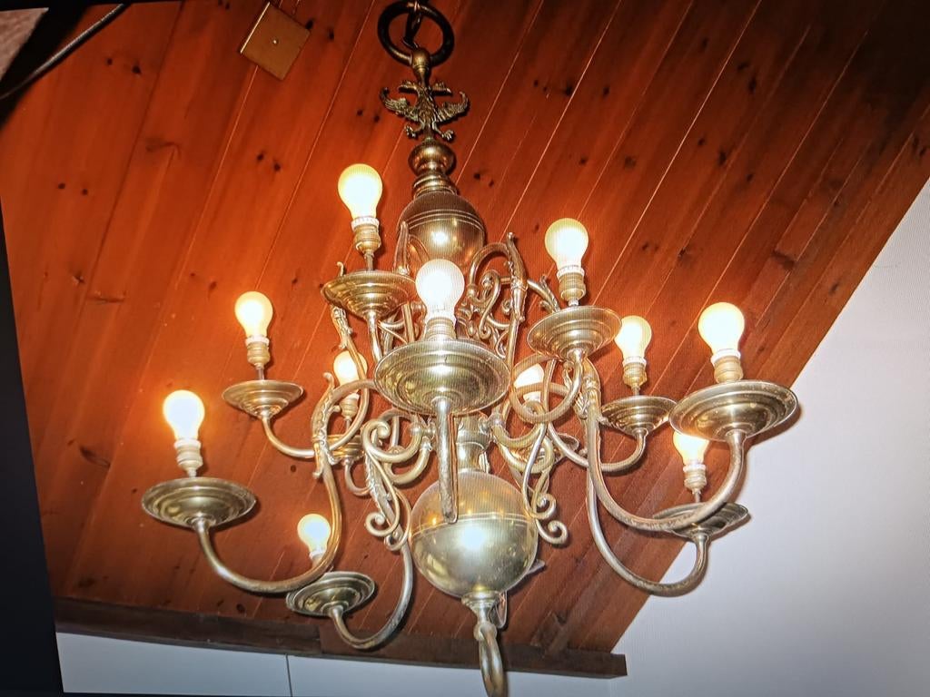 Antieke koperen kroonluchter, Ophalen